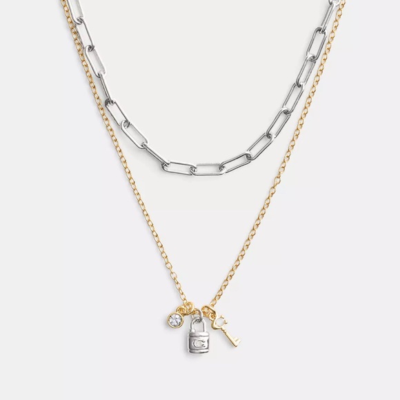Coach Lock & Key layered charm necklace. Plated brass, cubic zirconia. - Picture 1 of 3